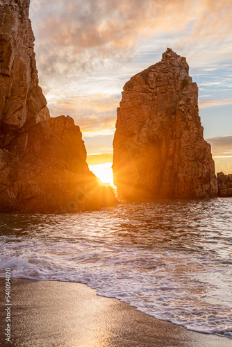 sunset rays. rocks on the ocean shore. incredible views on the beach in Portugal with a beautiful sky