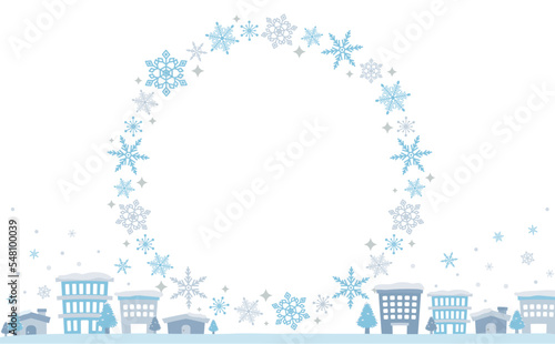 円形の雪の結晶と冬の街並みをあしらったコピースペースのあるフレーム_背景透過文字なし_寒色