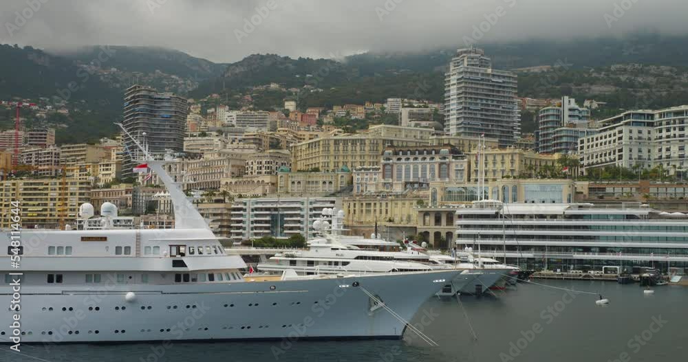 View Of White Large Yachts Docked During Daytime At Port Hercules, Monaco. - Static Shot View Of White Large Yachts Docked During Daytime At Port Hercules, Monaco. - Static Shot