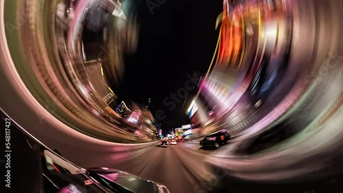 Time lapse fish-eye view of cars driving on the Las Vegas strip at night