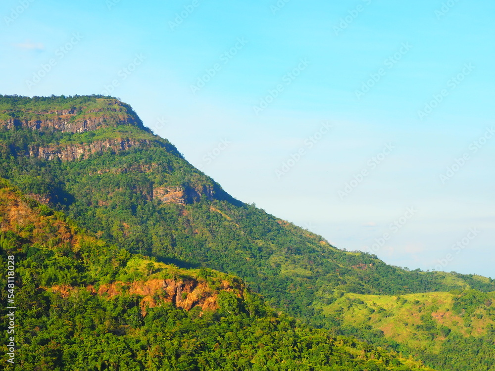 Beautiful landscape background of mountain and blue sky. Rest and relax in vacation concept. Beautiful landscape background of mountain and blue sky. Rest and relax in vacation concept.