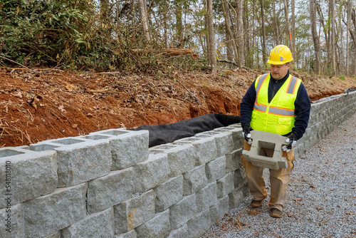Bild auf Leinwand In part of construction project that is building retaining walls on new site con