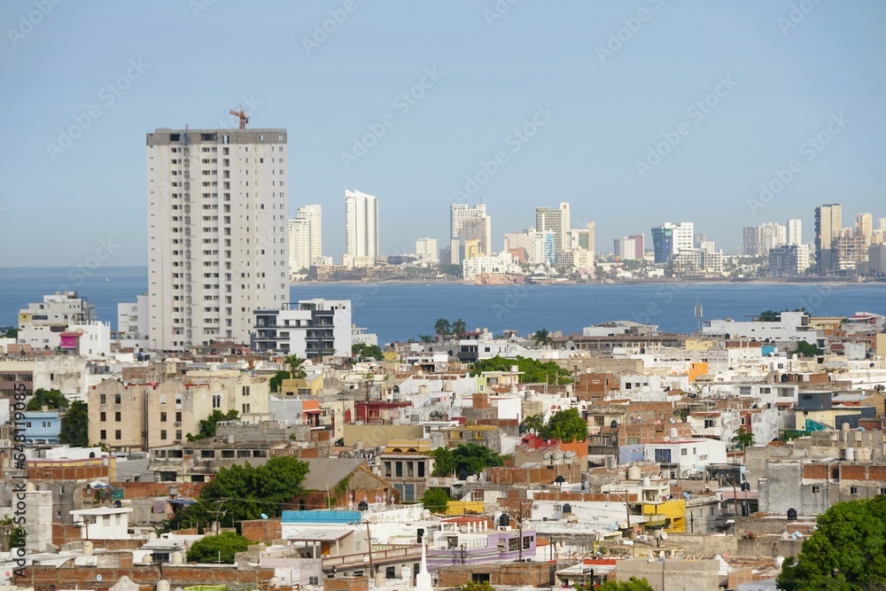 The view of the bay and buildings in the city on a sunny day near Mazatlan, Mexico 