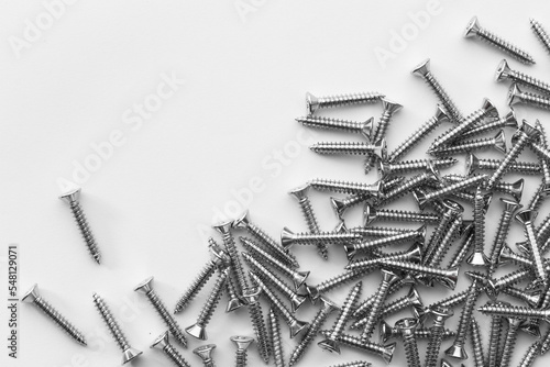Nuts   Bolts   Screws closeup on white background