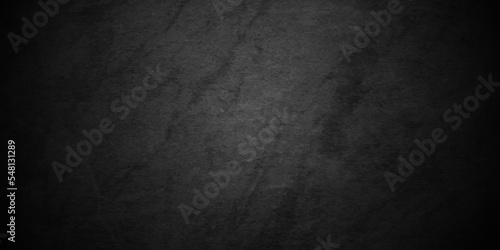 Fototapeta Naklejka Na Ścianę i Meble -  	
Black texture chalk board and black board background. stone concrete texture grunge backdrop background anthracite panorama. Panorama dark grey black slate background or texture.