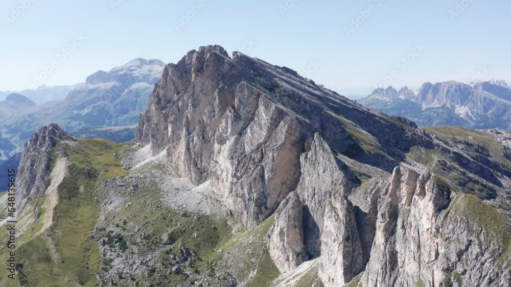 Mountain peak aerial orbit. Settsass mountain in Dolomites, Italy Mountain peak aerial orbit. Settsass mountain in Dolomites, Italy