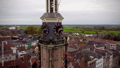 Drone footage of The Munttoren clock tower and Amsterdam cityscape in The Netherlands photo