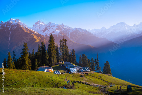 Mountain landscape in the Himalayas. Top view of the camping site in Himalayan mountains, Kasol, Parvati valley, Himachal Pradesh, northern India. 