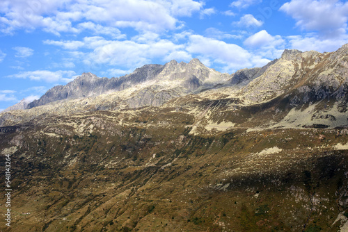 Mountain panorama at Swiss mountain pass Oberalppass on a sunny late summer morning. Photo taken September 5th, 2022, Oberalp Pass, Switzerland.