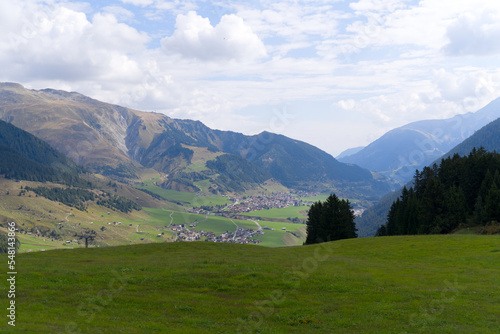 Beautiful scenic landscape at Alp Milez, Canton Graubünden, with villages Dieni, Rueras and Sedrun in the Swiss alps on a late summer day. Photo taken September 5th, 2022, Milez Dieni, Switzerland. 