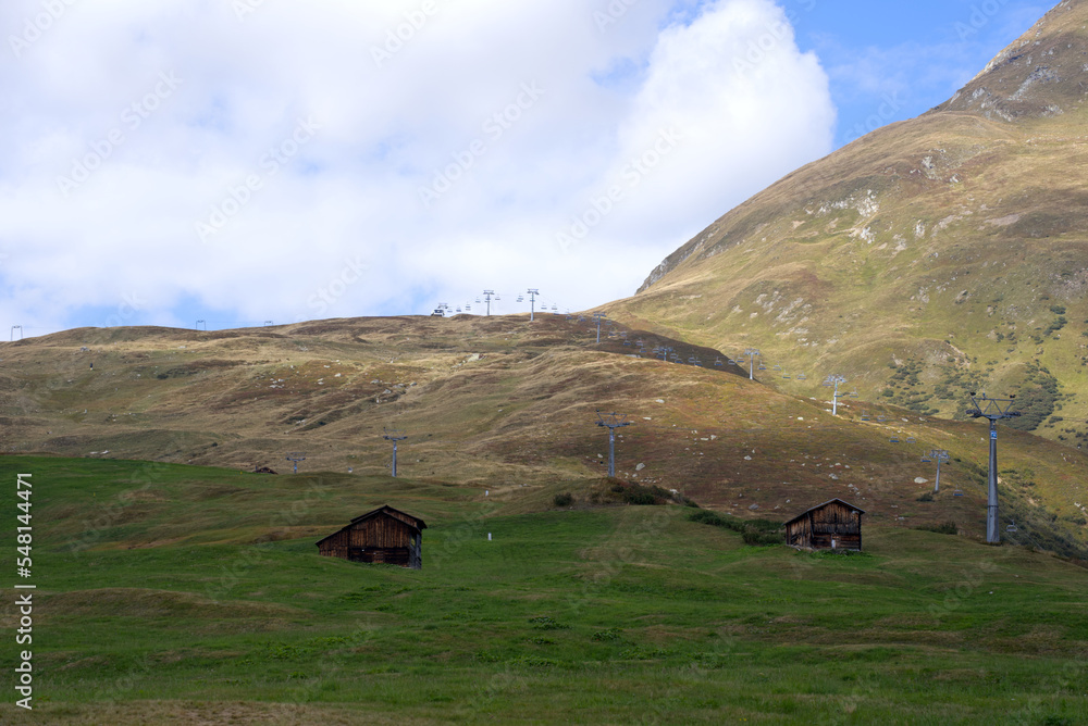 Obraz premium Beautiful scenic landscape at Alp Milez, Canton Graubünden, in the Swiss alps at region Oberalppass on a blue cloudy late summer day. Photo taken September 5th, 2022, Milez Dieni, Switzerland.