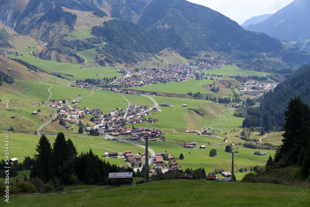Beautiful scenic landscape at Alp Milez, Canton Graubünden, with villages Dieni, Rueras and Sedrun in the Swiss alps on a late summer day. Photo taken September 5th, 2022, Milez Dieni, Switzerland.