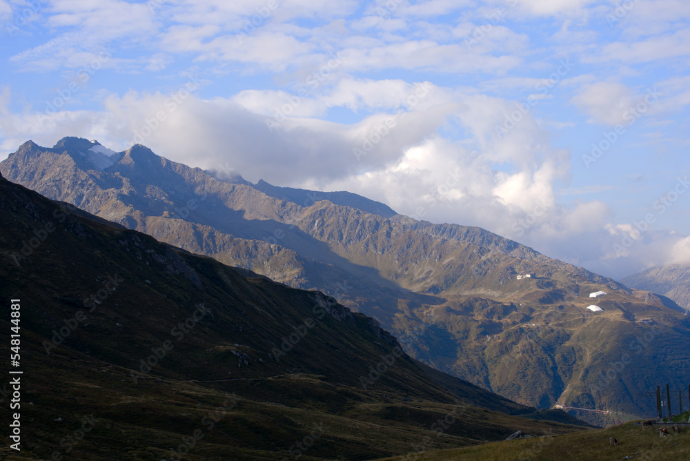 Mountain panorama at Swiss mountain pass Oberalppass on a sunny late summer morning. Photo taken September 5th, 2022, Oberalp Pass, Switzerland. Mountain panorama at Swiss mountain pass Oberalppass on a sunny late summer morning. Photo taken September 5th, 2022, Oberalp Pass, Switzerland.