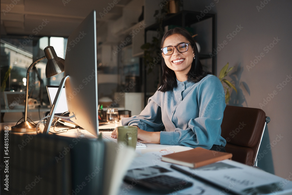 Business woman, computer and designer with smile for creative ambition, vision or goals at the office. Portrait of happy employee smiling in happiness for career in design or night shift at workplace Business woman, computer and designer with smile for creative ambition, vision or goals at the office. Portrait of happy employee smiling in happiness for career in design or night shift at workplace