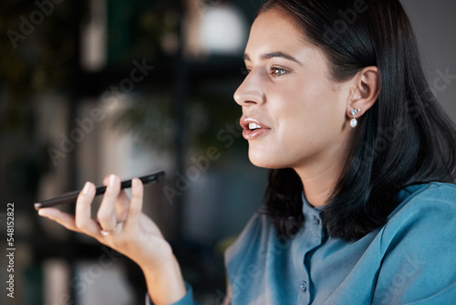 Phone call, voice note or memo with a business woman talking or recording a message while working. Face, thinking and communication with a female employee networking from her office at work