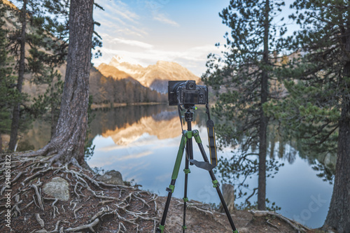 Canvas Print A tripod camera for shooting mountain landscape