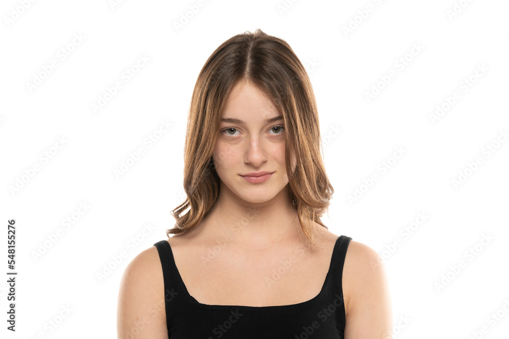beautiful young women with long hair and no makeup on a white background. beautiful young women with long hair and no makeup on a white background.