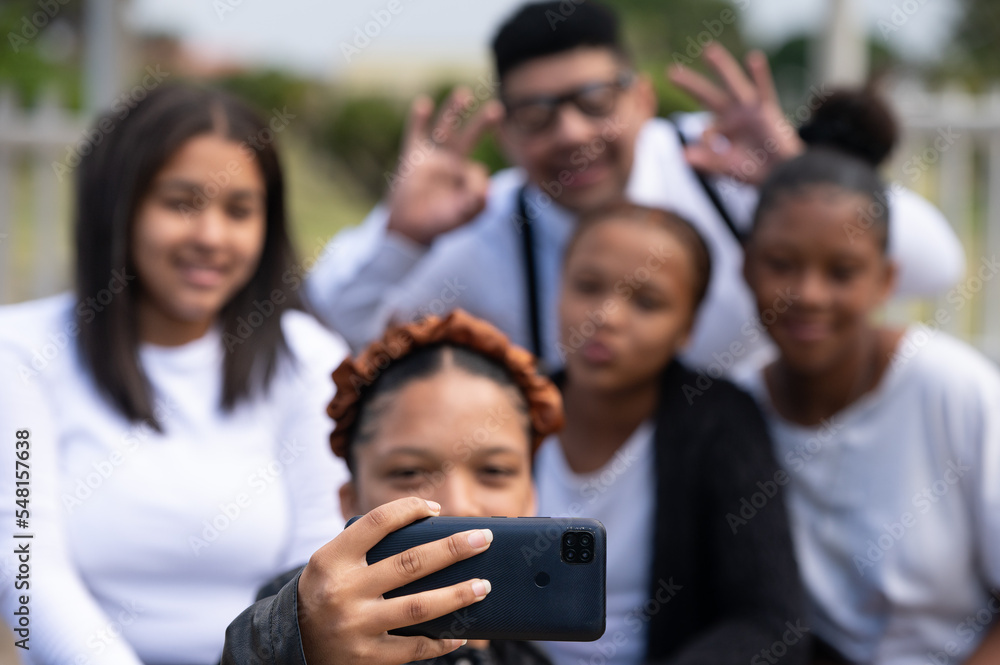 Portrait with selective focus of people taking a selfie Portrait with selective focus of people taking a selfie