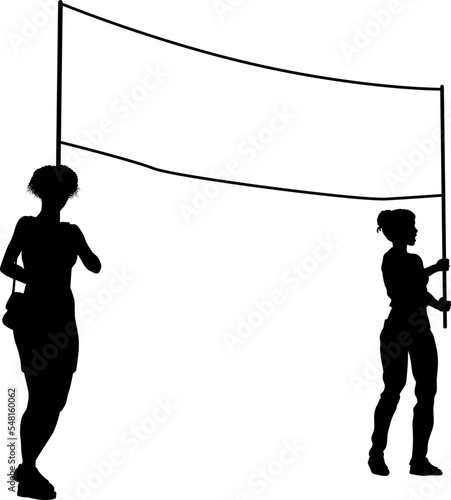 Two protestors or demonstrators at a demonstration march, picket line or strike protest rally in silhouette. Holding up a banner sign.