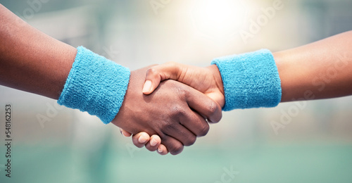 Handshake, sport with motivation and support, solidarity with congratulations or partnership, hands together closeup. Exercise, wrist band and fitness, active lifestyle with team shaking hands.