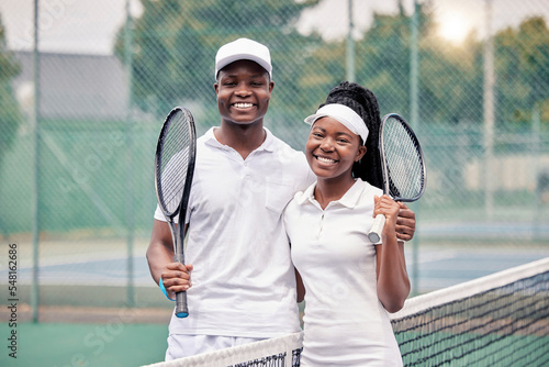 Couple, tennis and sport portrait, training and exercise together outdoor, racket and net together with smile. Black man, woman and sports workout, tennis court and happy with health and wellness © L Ismail/peopleimages.com