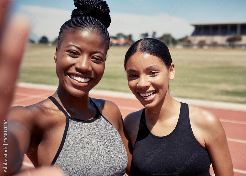 Friends, selfie and running with women on stadium track for training, sprinting and stamina endurance. Cardio, workout and sports with portrait of runner for teamwork, collaboration and sprinting Friends, selfie and running with women on stadium track for training, sprinting and stamina endurance. Cardio, workout and sports with portrait of runner for teamwork, collaboration and sprinting
