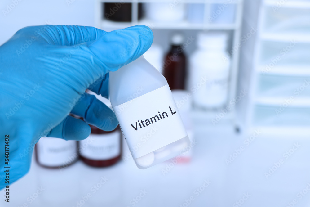 Vitamin L pills in a bottle, food supplement for health