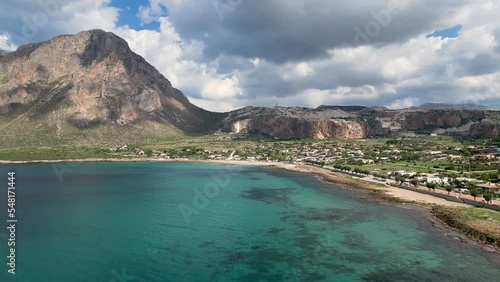 Drone view of the Mediterranean coast and Monte Cofano mountain. Turquoise sea and sunny morning. Custonaci. Sicily. Italy photo