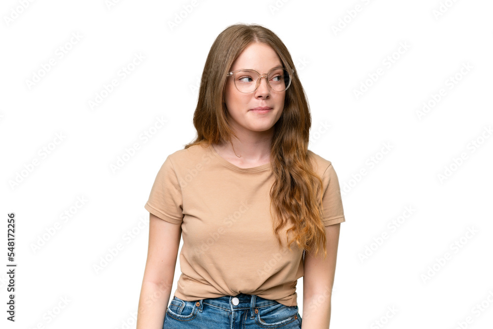 Young pretty woman over isolated background having doubts while looking up Young pretty woman over isolated background having doubts while looking up