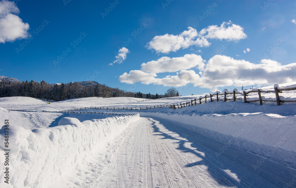 a snowy path in the high mountains