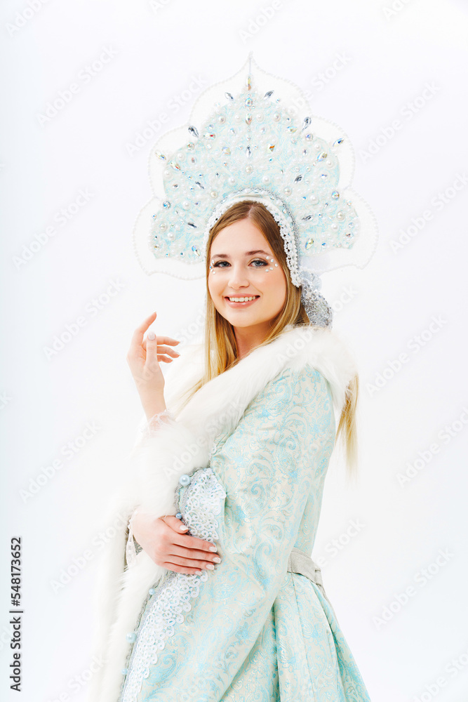 portrait of Snow Maiden in a traditional costume with a kokoshnik on a white. portrait of Snow Maiden in a traditional costume with a kokoshnik on a white.