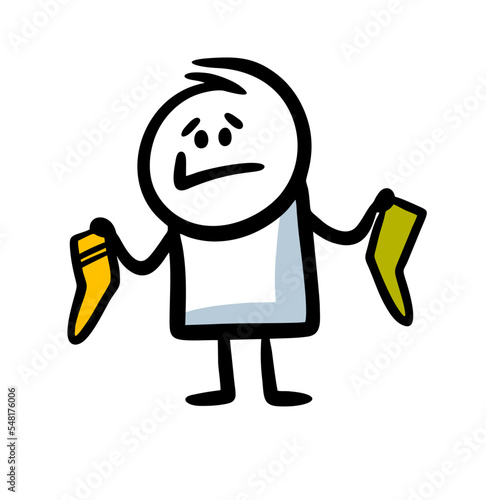 A funny man with a grin holds two socks of different colors and is surprised at his absent-mindedness.