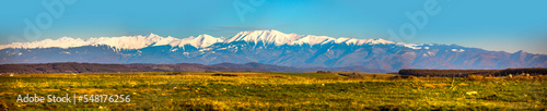 Panorama of Fagaras mountain range from sibiu, Romania. Fall mountains with snow covered mountain peaks.