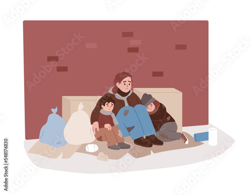 Homeless people living on the streets. Woman sitting on the ground with children. Nowhere to go. Unemployed hungry poor.  Expensive high rent. Social inequality. Social issue, unemployment problem
