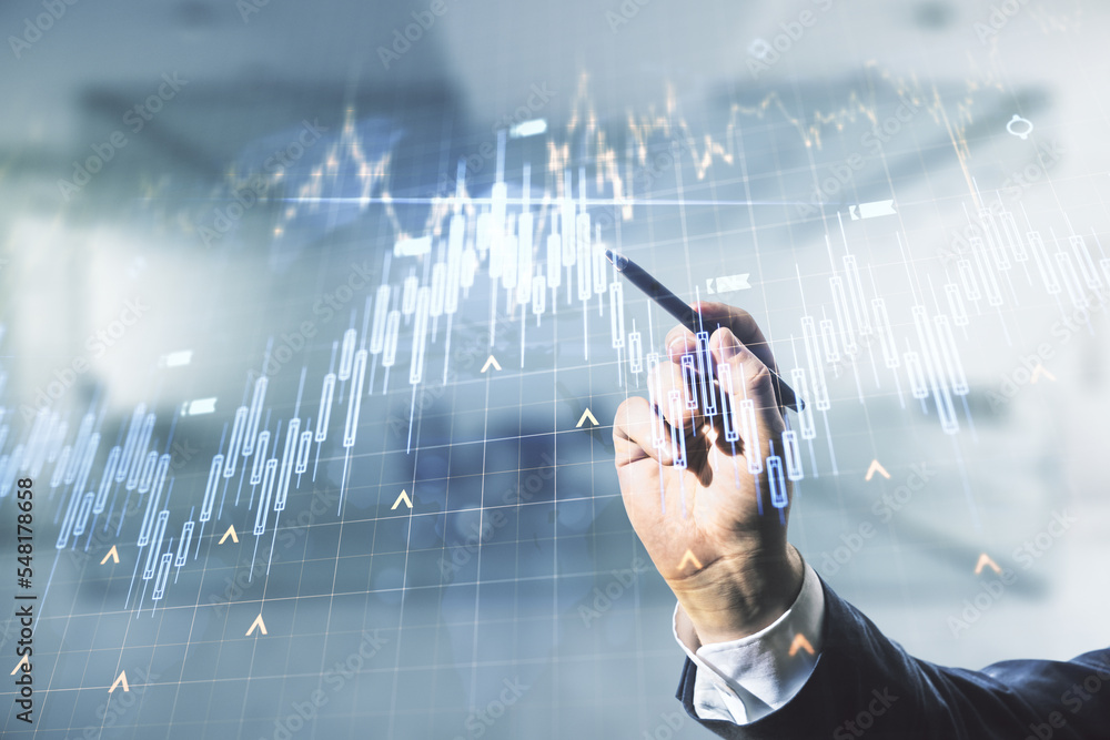 Trade Background Design Multi exposure of trader hand with pen working with virtual abstract ...