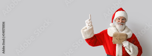 Santa Claus with letters po...