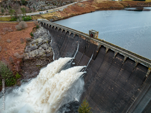 Hydroelectric Power Station Pumping Water Through a Dam