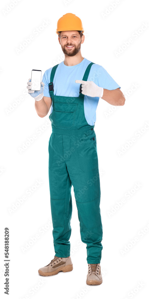 Professional repairman in uniform showing smartphone on white background Professional repairman in uniform showing smartphone on white background