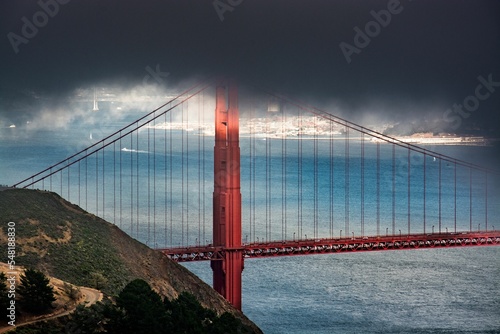 Breathtaking aerial view of dark clouds above the Golden Gate Bridge in San Francisco, California