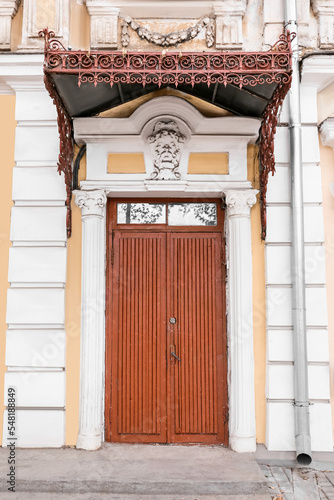 Old building with wooden do...