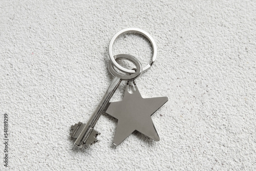 Key with star shaped keycha...
