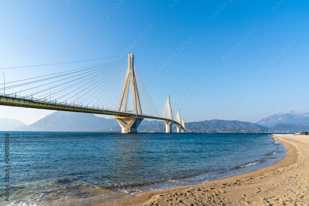 landscape view of the landmark Rio-Antirio Bridge across the Gulf of Corinth landscape view of the landmark Rio-Antirio Bridge across the Gulf of Corinth