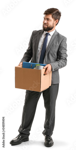 Fired young man holding box with personal stuff on white background © Pixel-Shot