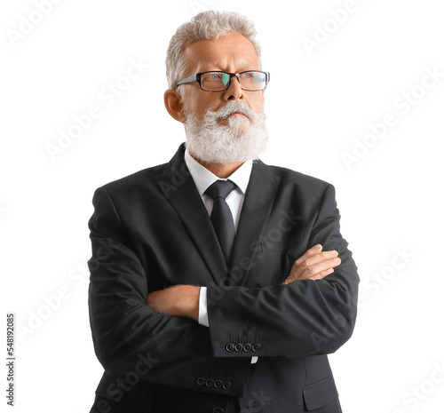 Senior bearded man in eyeglasses and black suit on white background