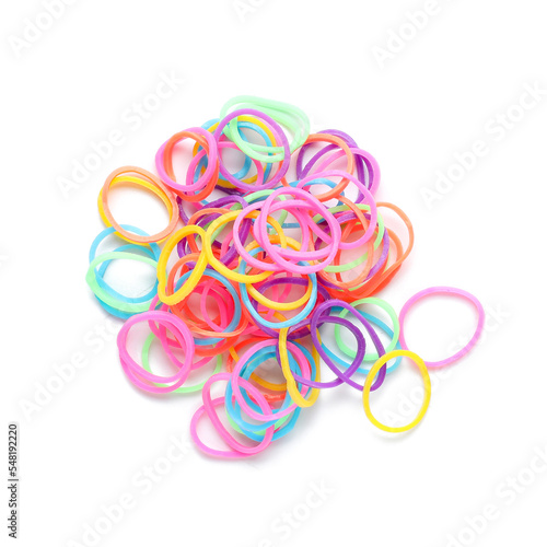 Heap of office colorful rubber bands isolated on white background