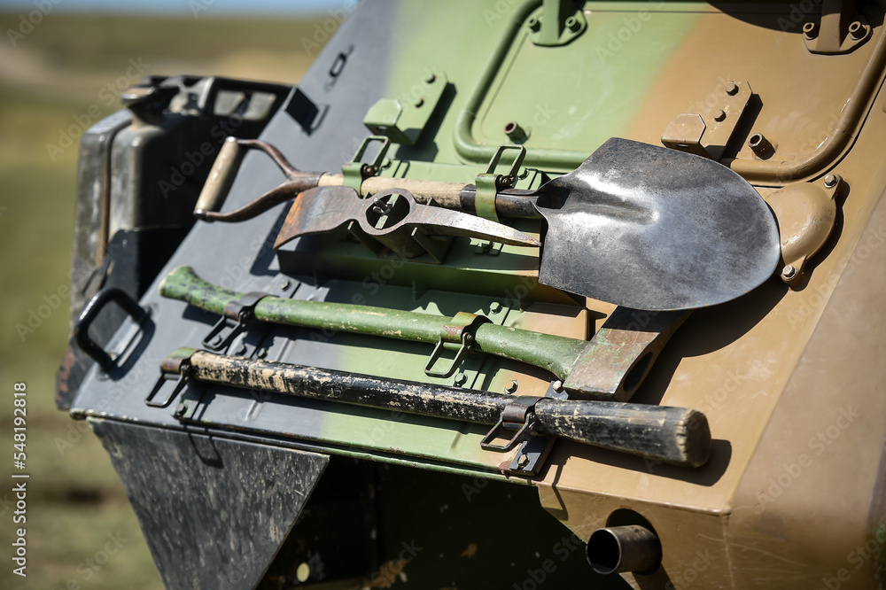 Off road rescue tools are seen on the back of a military vehicle Off road rescue tools are seen on the back of a military vehicle