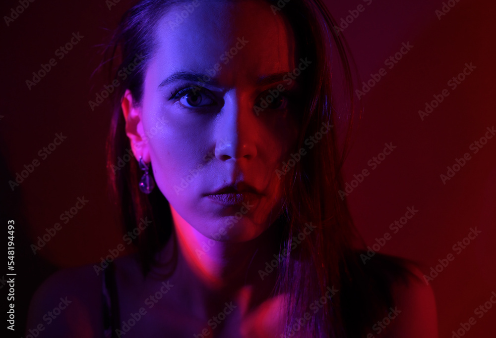 Abstract portrait of a woman with colored light.