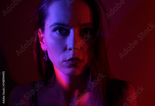 Abstract portrait of a woman with colored light.