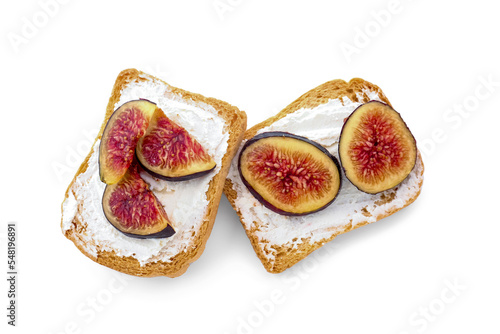 Tasty bruschettas with cream cheese and figs on white background