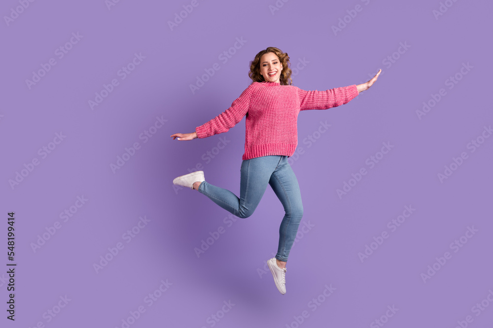Full length view photo cute active youth have holidays jump isolated pullover denim purple background